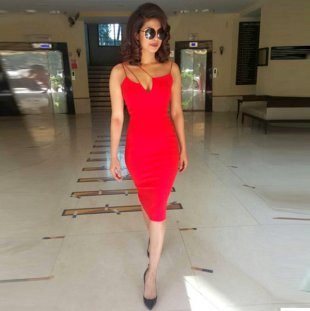 Priyanka Chopra rocking the RED HOT dress will give you all the Christmas feels!